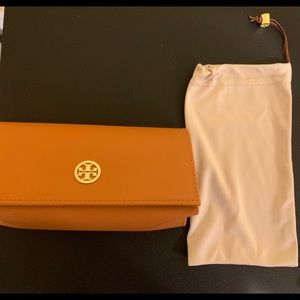 Tory Burch sunglasses case.